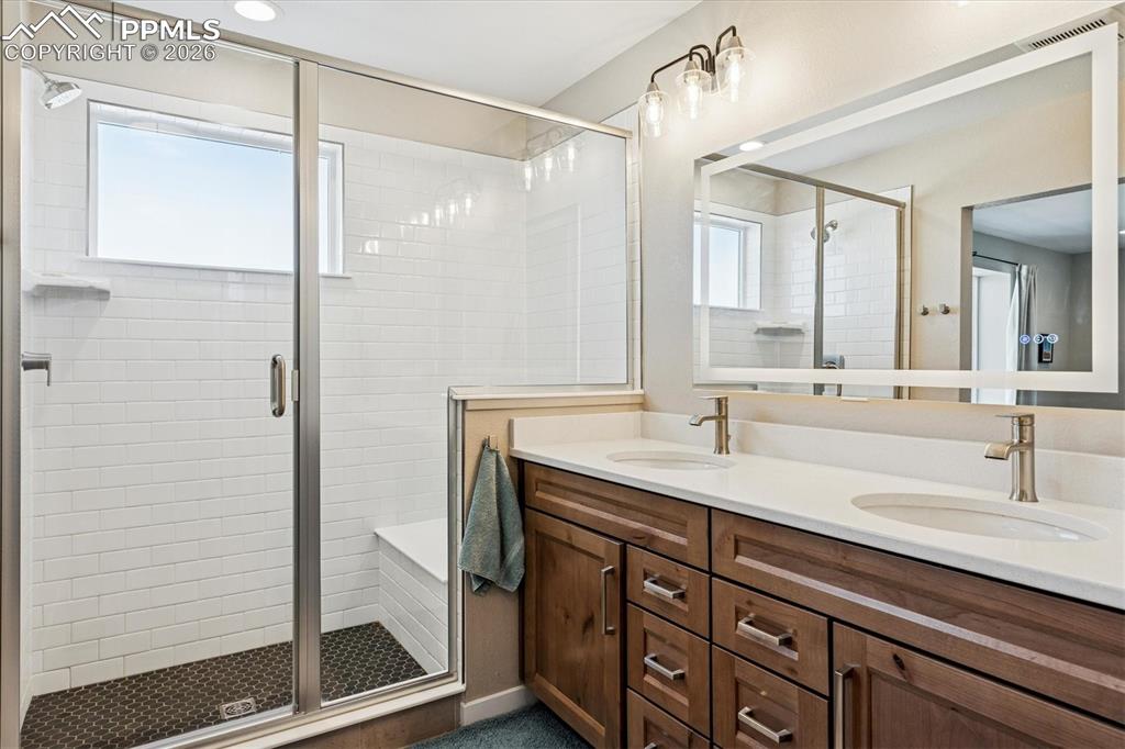 Image 14 of 22: Primary 3/4 Bath with Double Vanity & Shower