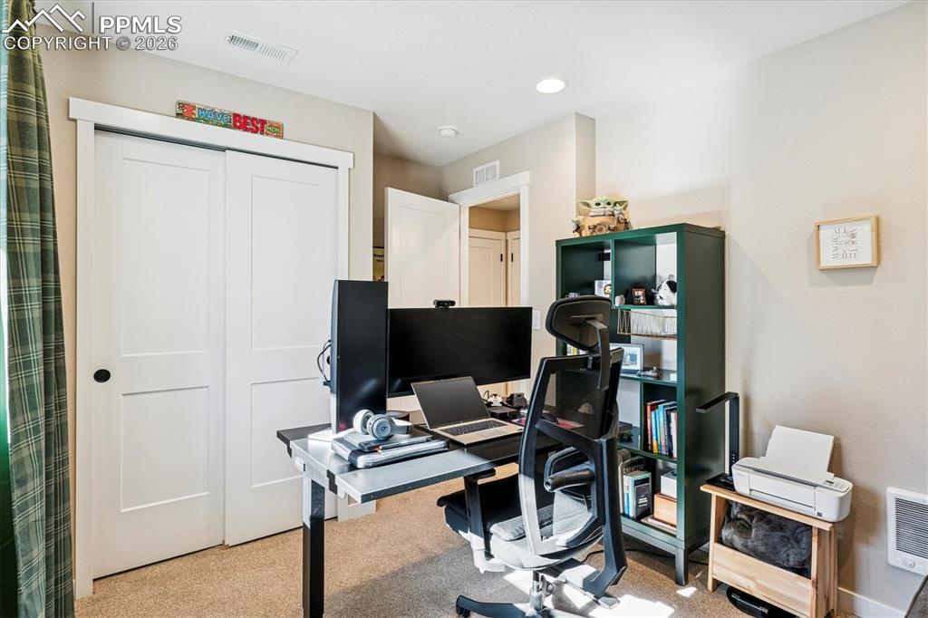 Image 18 of 22: Bedroom #3 with Reach-in Closet & Carpet