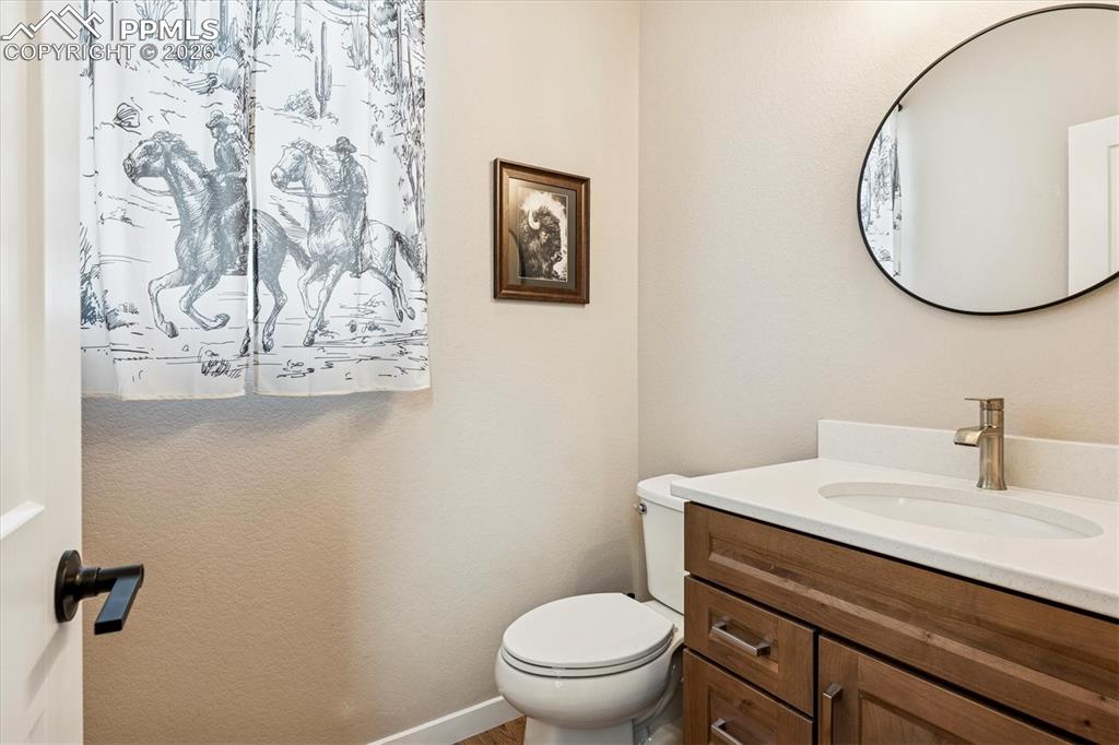 Image 8 of 22: Main Level Powder Room