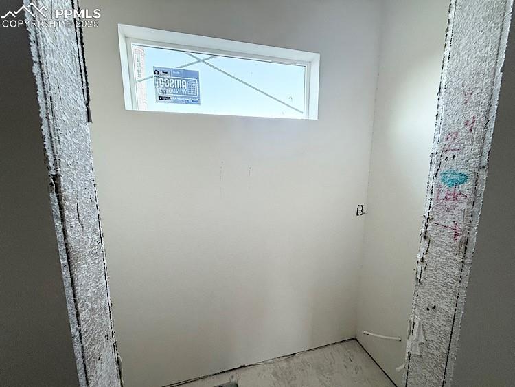 Image 11 of 29: Powder Room conveniently located on the main level! Please, excuse our dust