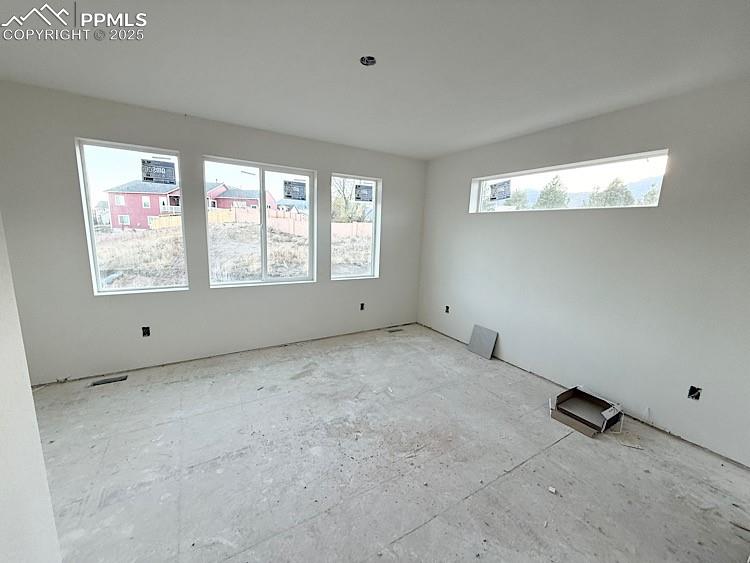 Image 14 of 29: Primary Suite with plush bathroom and walk-in closet, located on the upper 