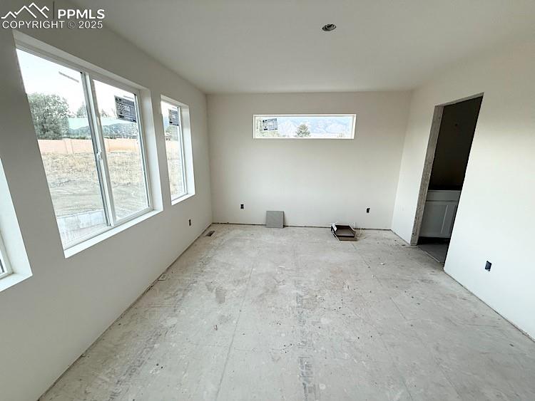 Image 15 of 29: Primary Suite with plush bathroom and walk-in closet, located on the upper 