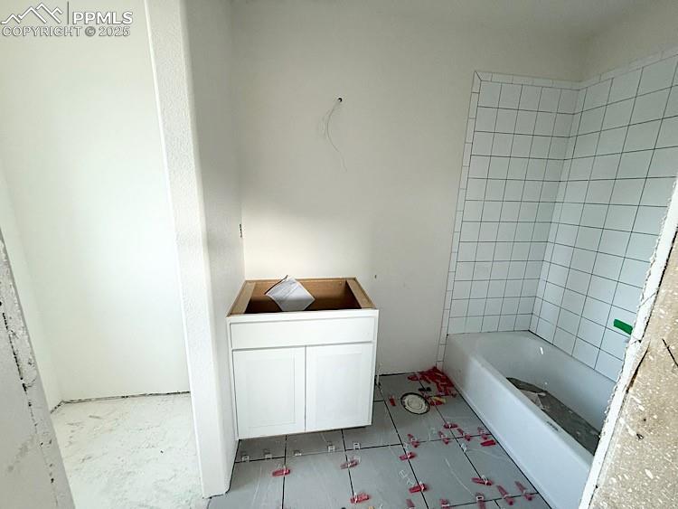 Image 25 of 29: Ensuite bathroom to upper bedroom. Please, excuse our dust as this home is 