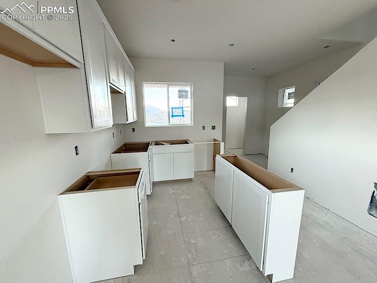 Image 3 of 29: Kitchen and luxurious Main Level to entertain! Please, excuse our dust as t