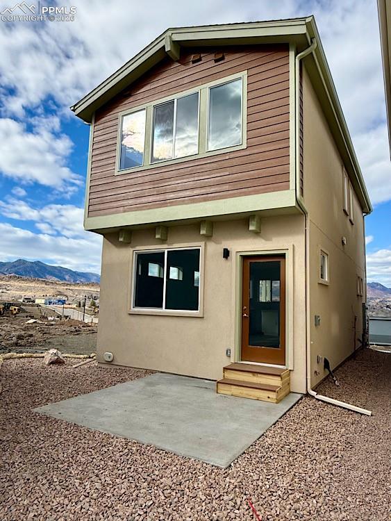 Image 32 of 35: Back of Home. Please, excuse our dust as this home is currently under const