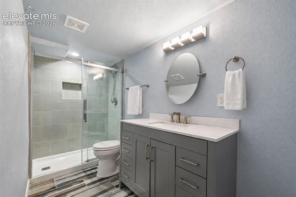 Image 13 of 17: basement bathroom