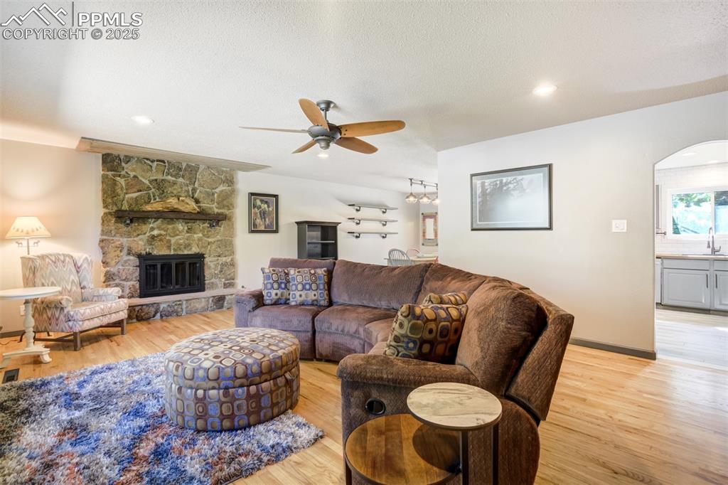 Image 10 of 50: Natural wood floors with lots of natural light in the living room