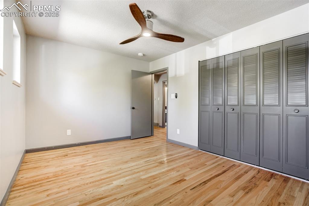 Image 29 of 50: 2nd bedroom on the upper level with large closet