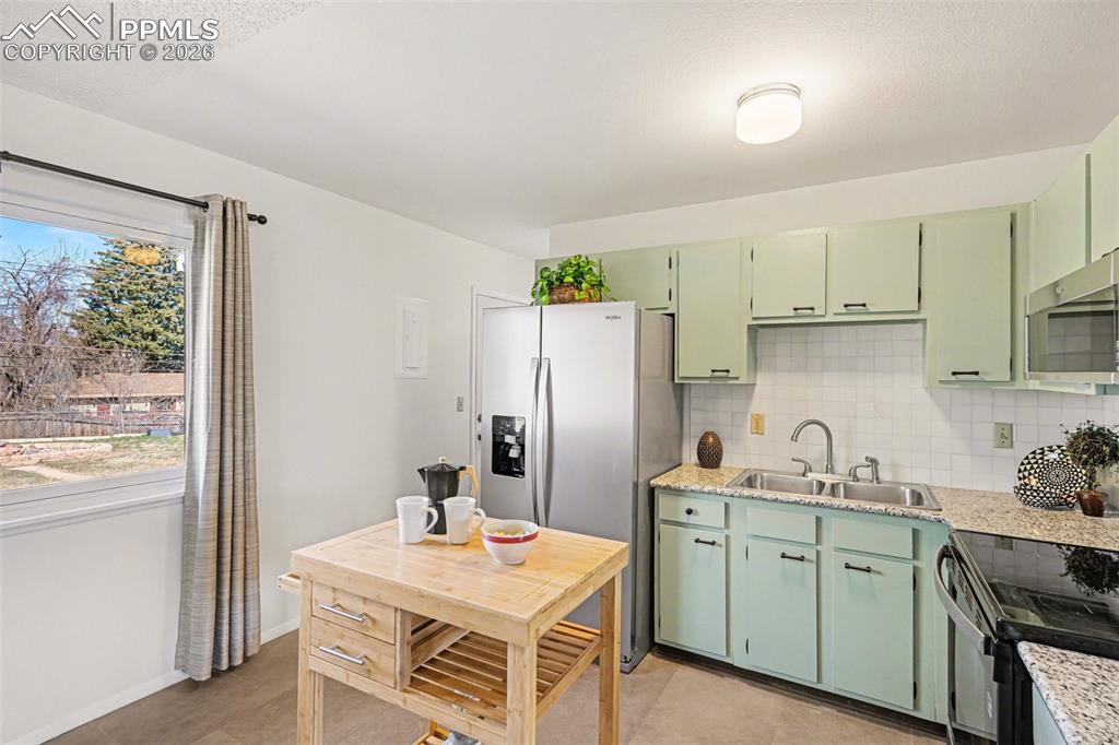 Image 7 of 21: Fully refreshed interior that feels bright, modern, and welcoming.