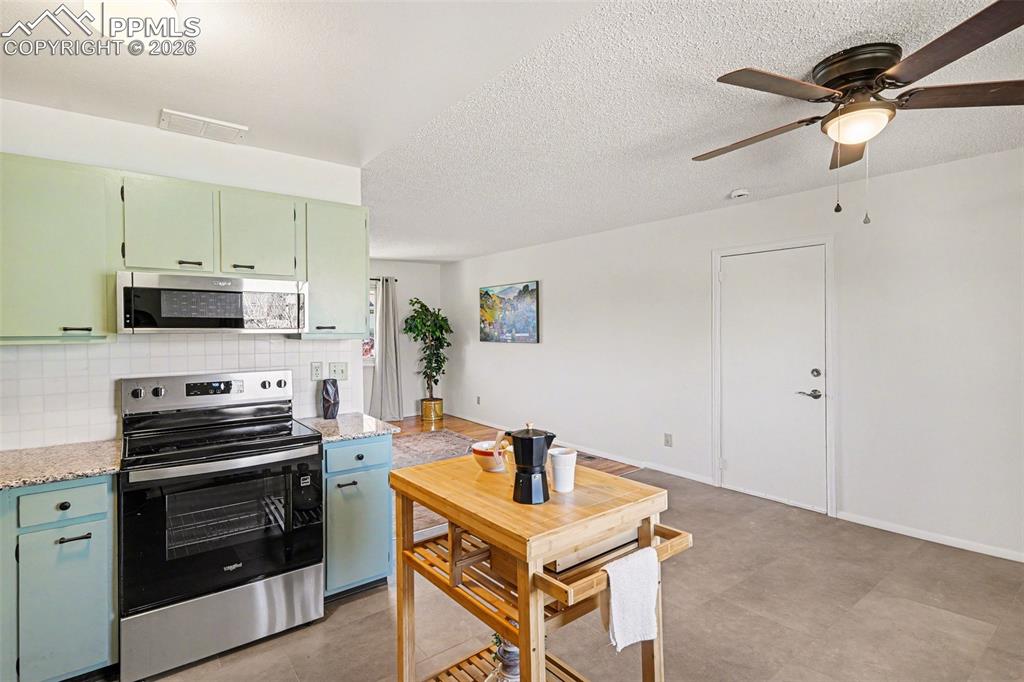 Image 9 of 21: Spacious kitchen and dining