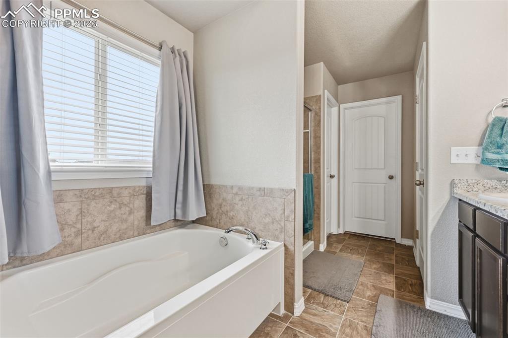 Image 13 of 30: Master Bathroom