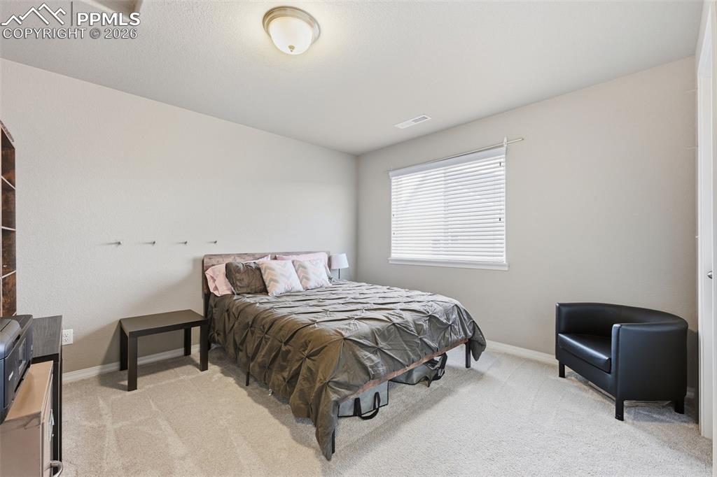 Image 14 of 30: Bedroom