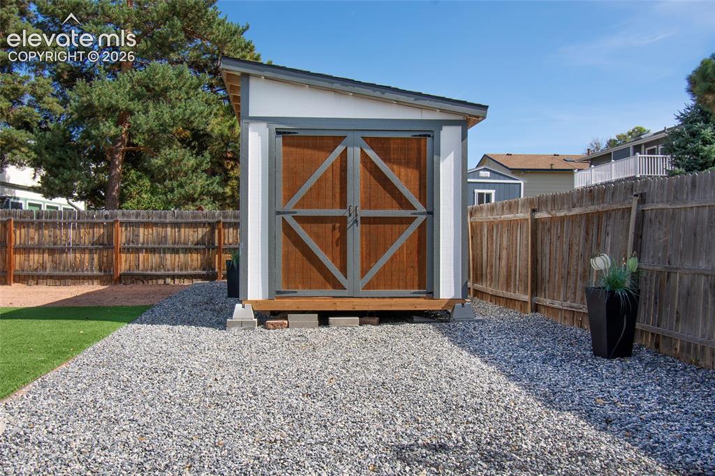 Image 26 of 26: New 10 X 20 shed.