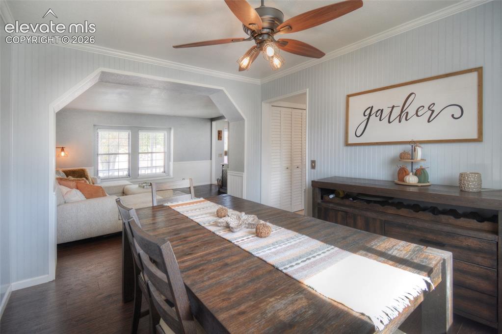 Image 8 of 26: LVP flooring flows through to the formal dining room off of the kitchen and