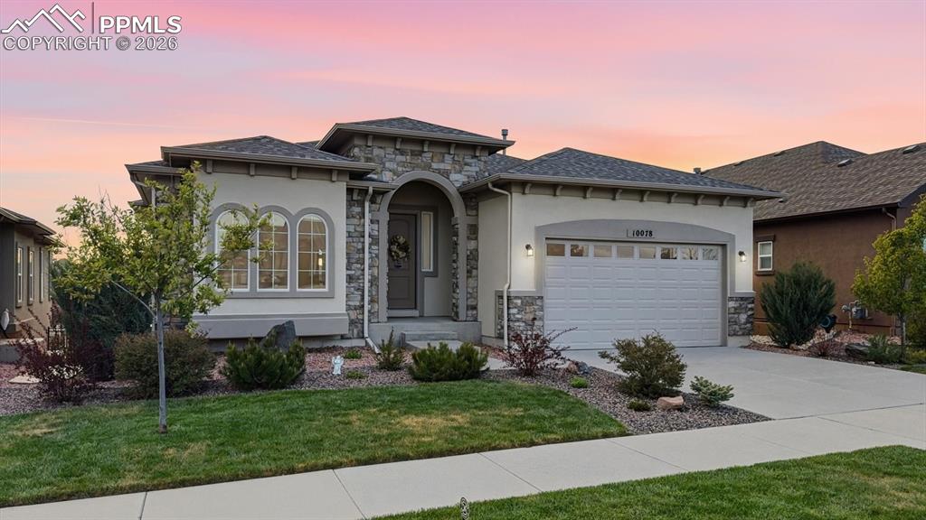 Image 1 of 50: Stunning stucco/stone ranch-style home in the desirable Stonebridge at Meri