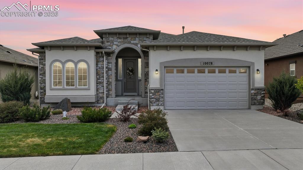 Image 12 of 50: Exceptional curb appeal w/ low-maintenance landscaping, auto sprinklers, &