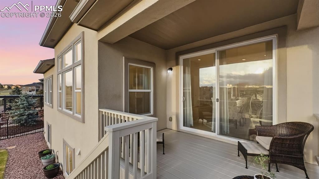 Image 22 of 50: Covered deck located off the Dining Nook for outdoor dining and relaxation.
