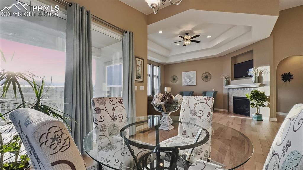 Image 23 of 50: Informal Dining Nook with views into the elegant Living Room.