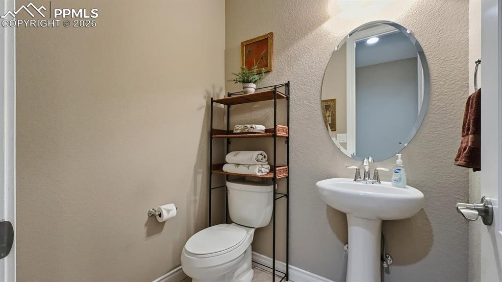 Image 29 of 50: Convenient main level Powder Bathroom.