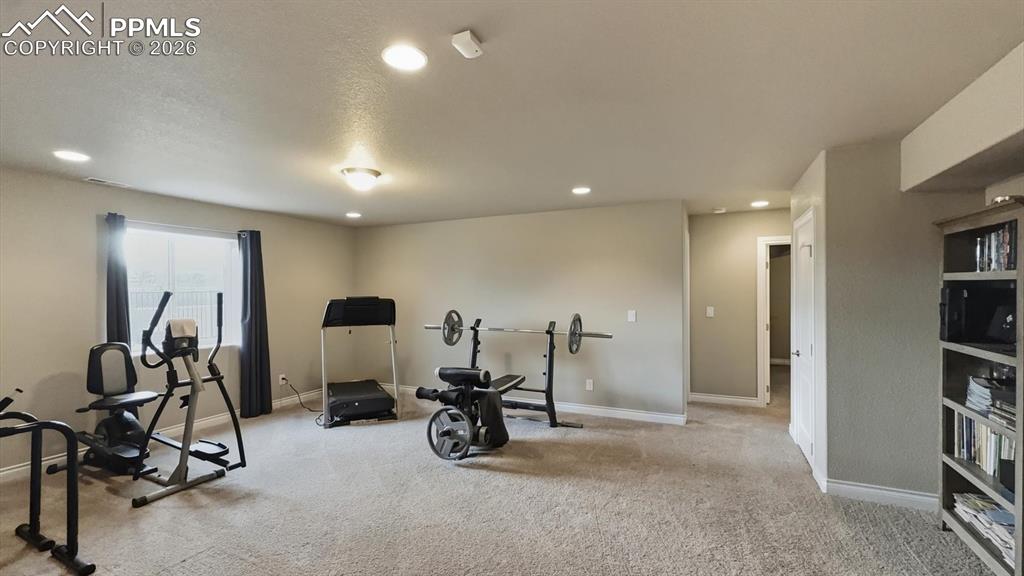 Image 40 of 50: Exercise area of the Basement Family/Rec Room.