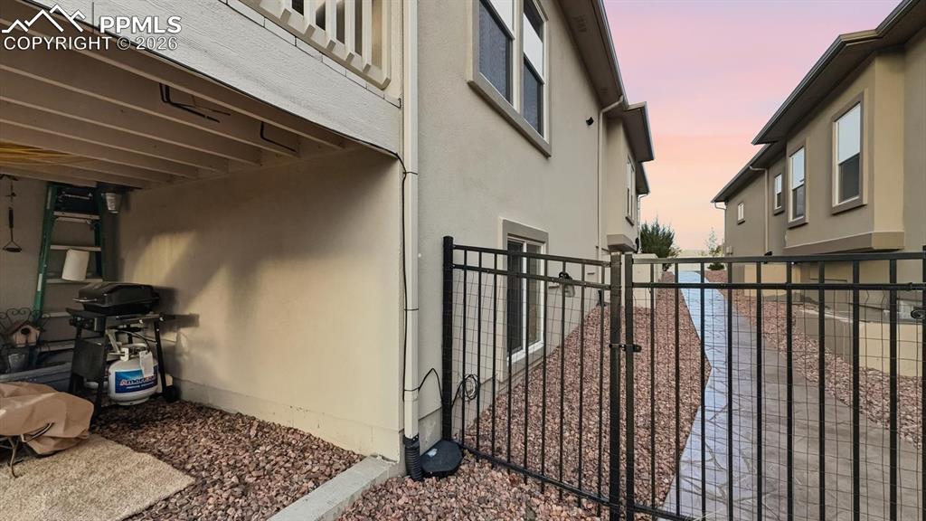 Image 50 of 50: Side yard with flagstone walkway.