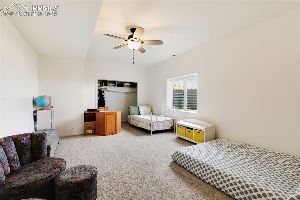 Image 28 of 41: Huge basement bedroom has an attached bath.