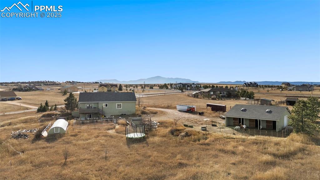 Image 40 of 41: Those mountain views can be seen from the front porch and windows.
