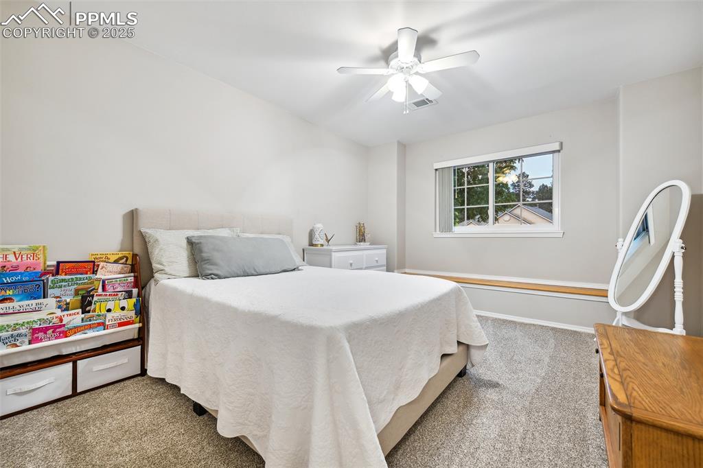 Image 24 of 47: Bedroom featuring carpet and a ceiling fan