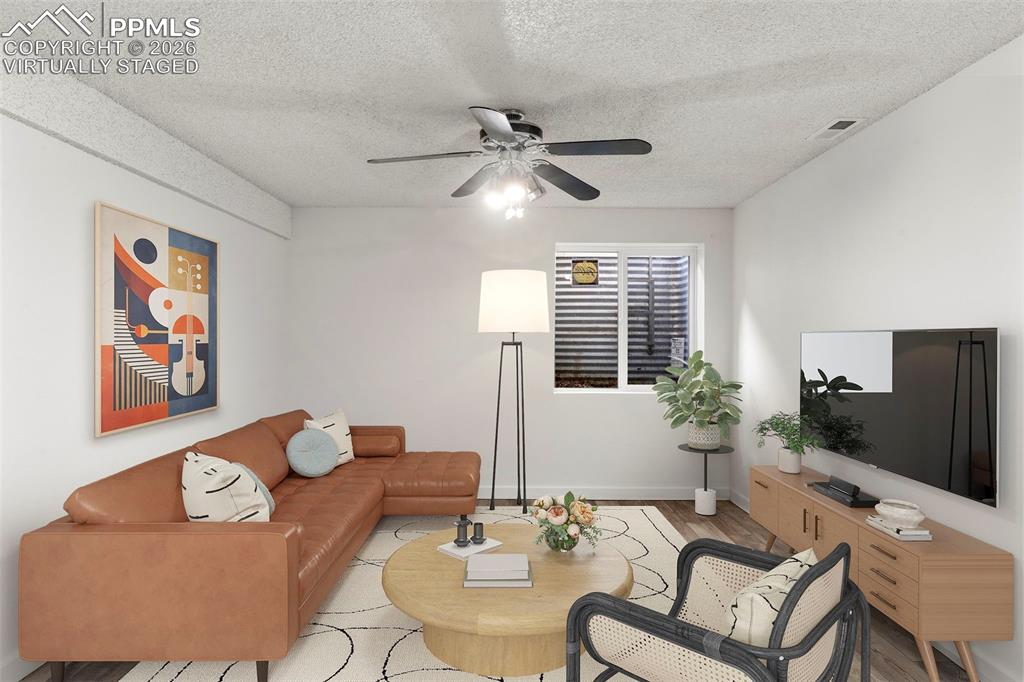 Image 19 of 24: virtually staged family room