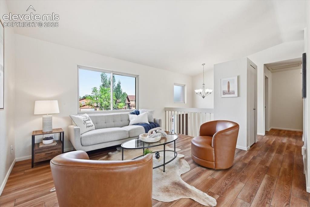 Image 10 of 32: Bright and sunny with natural lighting, new flooring and new paint!