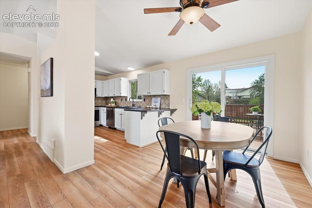 Image 14 of 32: View from dining area to kitchen!