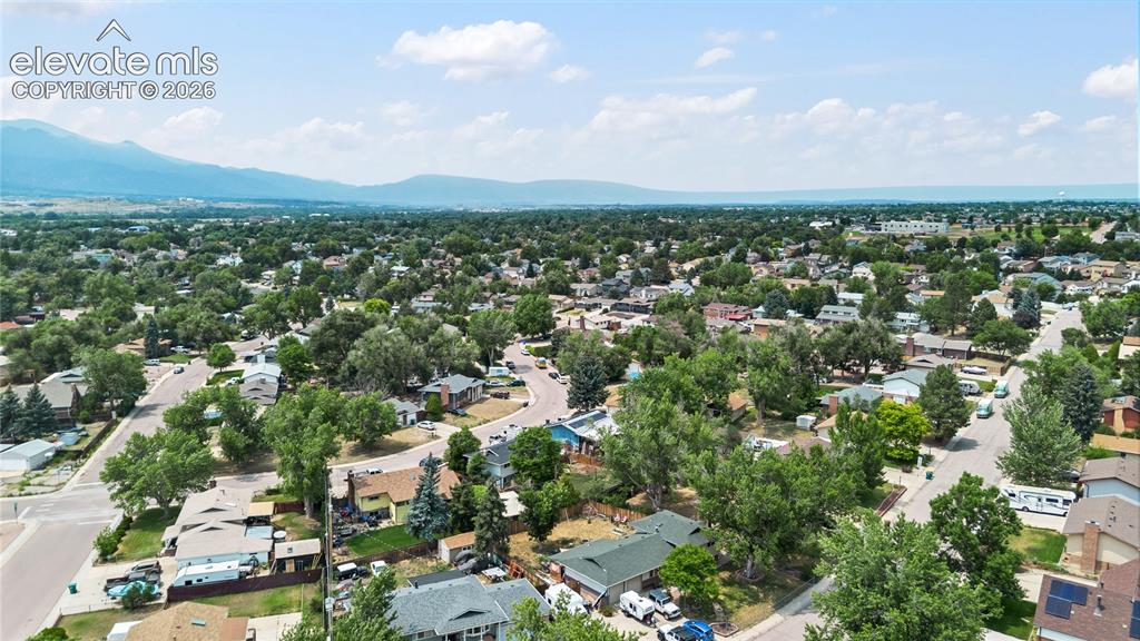 Image 23 of 25: Aerial view of the properties location within and established neighborhood 
