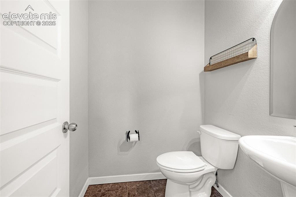 Image 31 of 44: White paneled door with polished chrome hardware