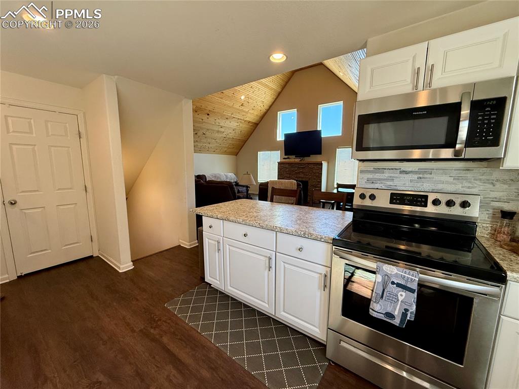 Image 12 of 50: Kitchen opens to the Spacious Living/Dining room