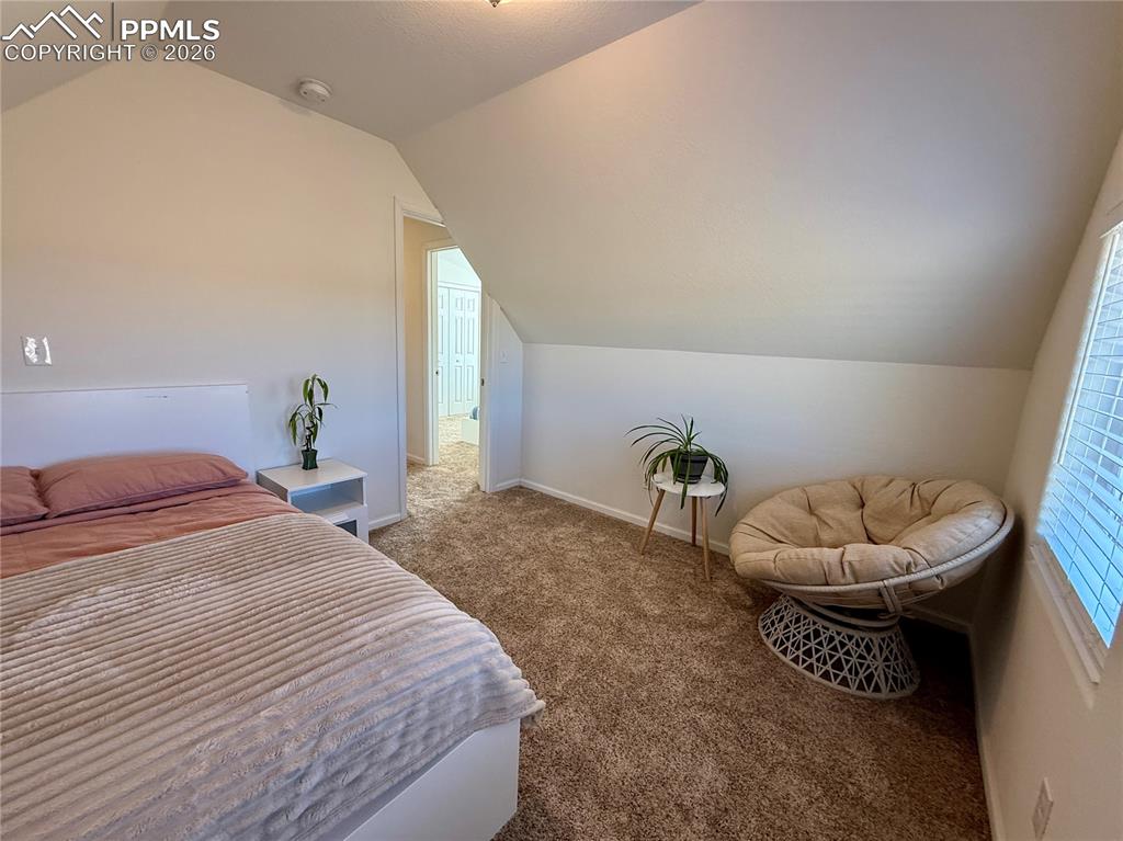 Image 20 of 50: Adorable upper level bedroom