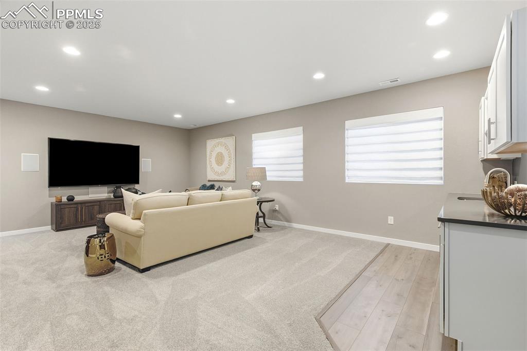 Image 32 of 49: Large rec room with built-in sound system