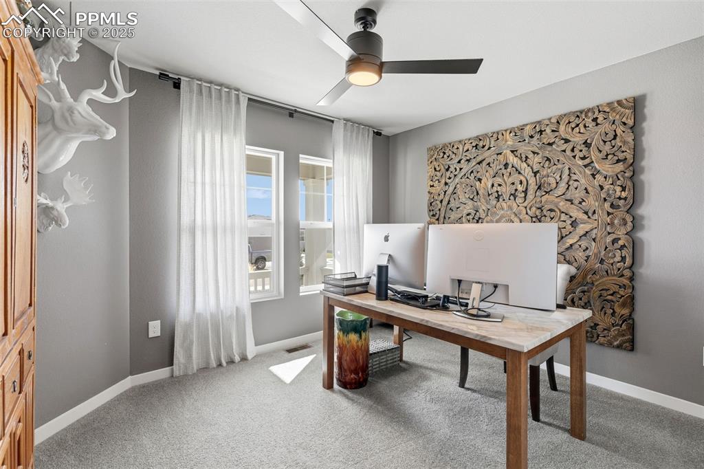 Image 8 of 49: 2nd main level bedroom used as an Office