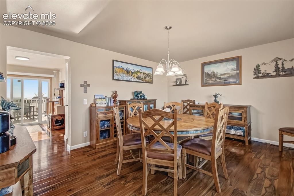 Image 11 of 43: Spacious dining room, just steps from the kitchen.
