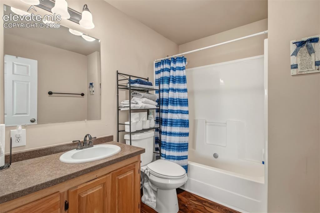 Image 20 of 43: Additional full bathroom on the main level.