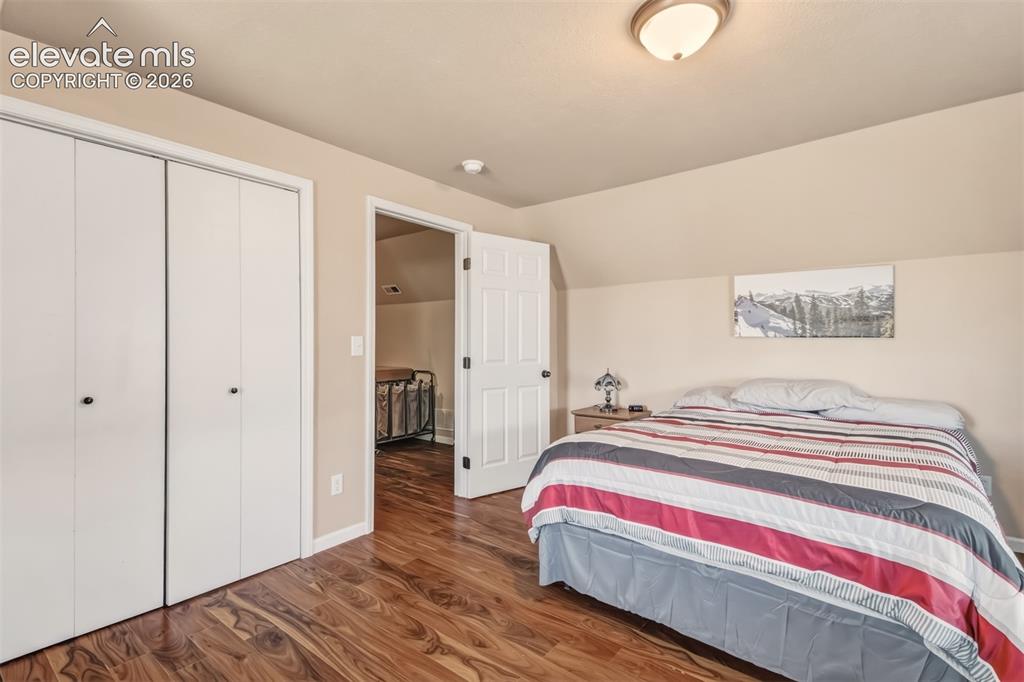 Image 24 of 43: Alternate view of the 3rd bedroom, looking towards the loft.