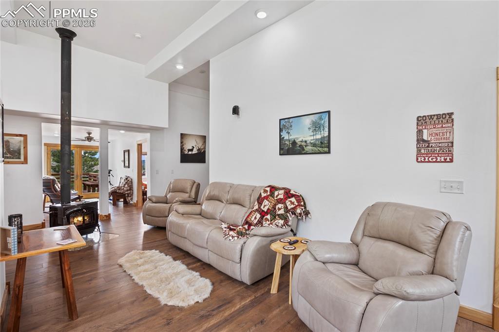 Image 15 of 33: A spacious family room to enjoy the fire!