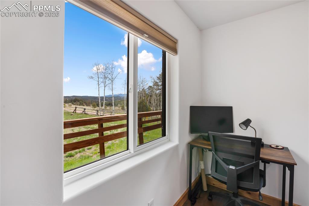 Image 20 of 33: Plenty of room for an office nook in bedroom 1.