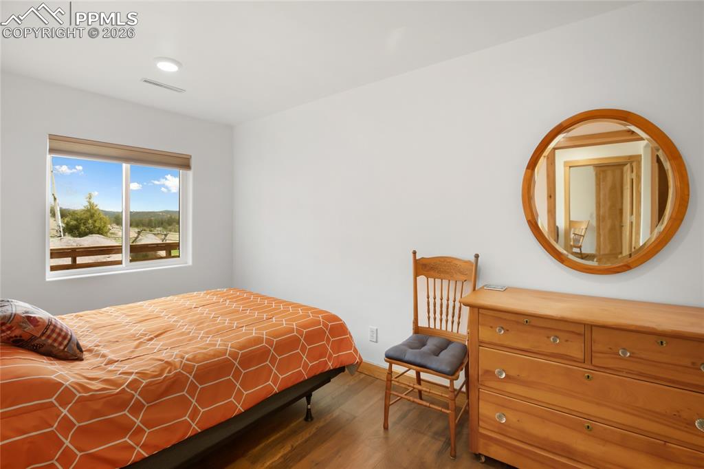 Image 22 of 33: Bedroom 2 of 3.  So much light!