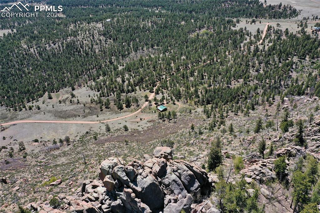 Image 27 of 33: Trees, meadows and rock outcroppings!