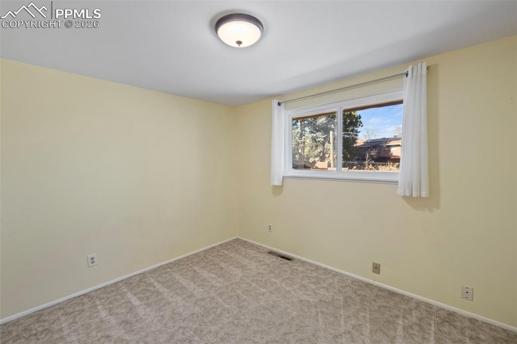 Image 22 of 40: Bedroom