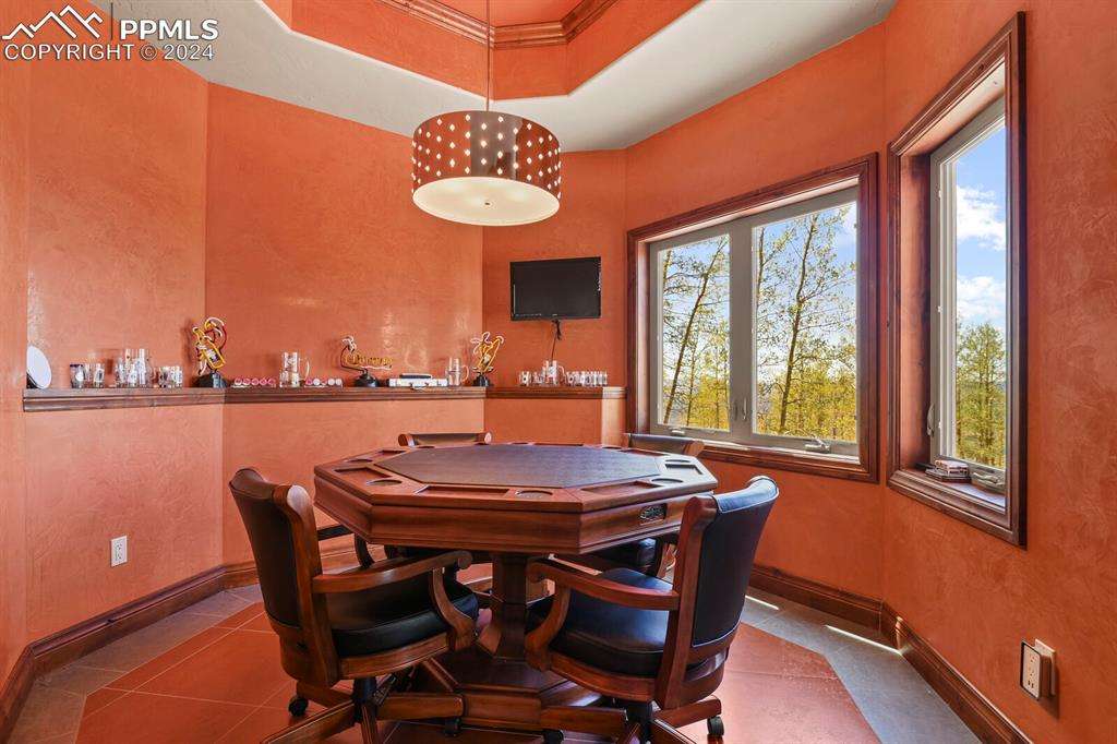 Image 36 of 50: View of tiled dining room