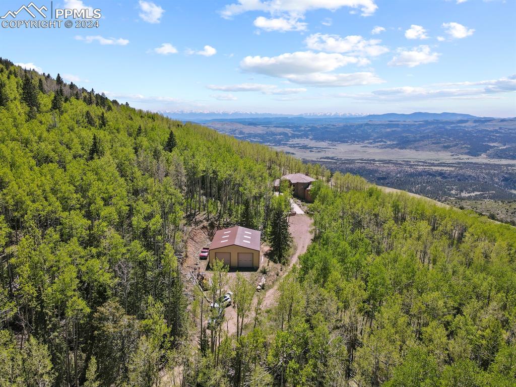 Image 46 of 50: Aerial view featuring a mountain view