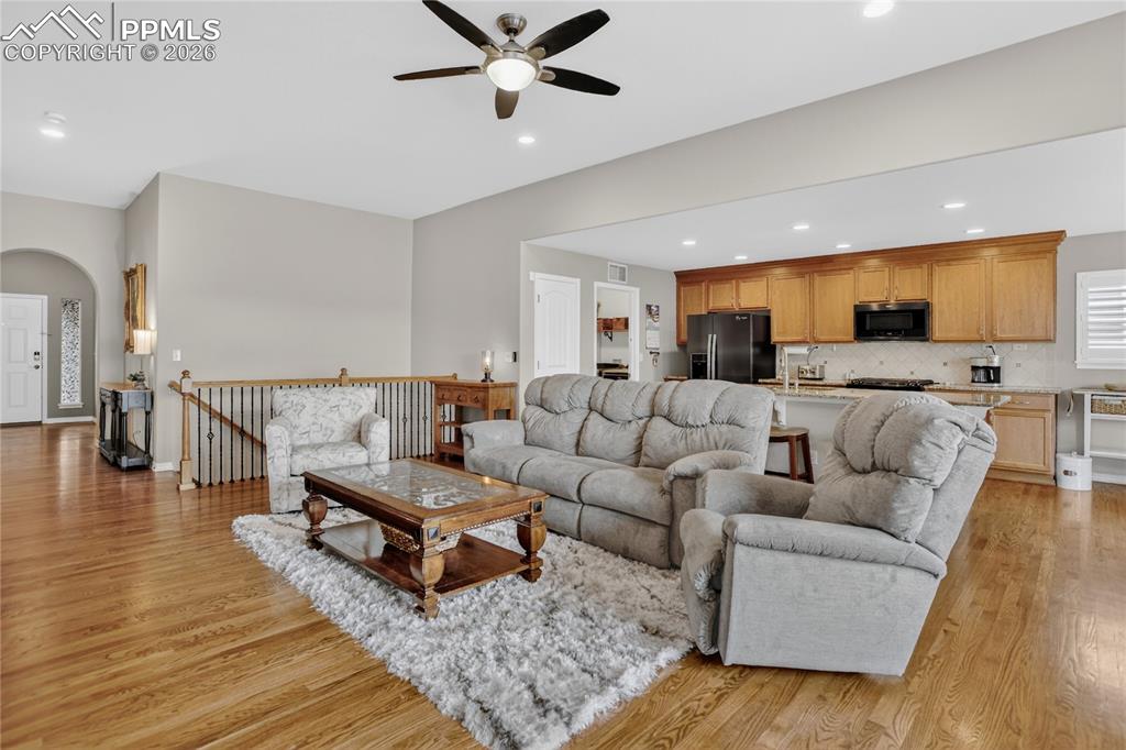 Image 2 of 25: Red oak flooring through main living spaces