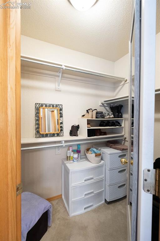 Image 19 of 37: Lots of hanging and drawer space.