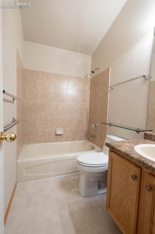 Image 24 of 37: Main level bathroom.